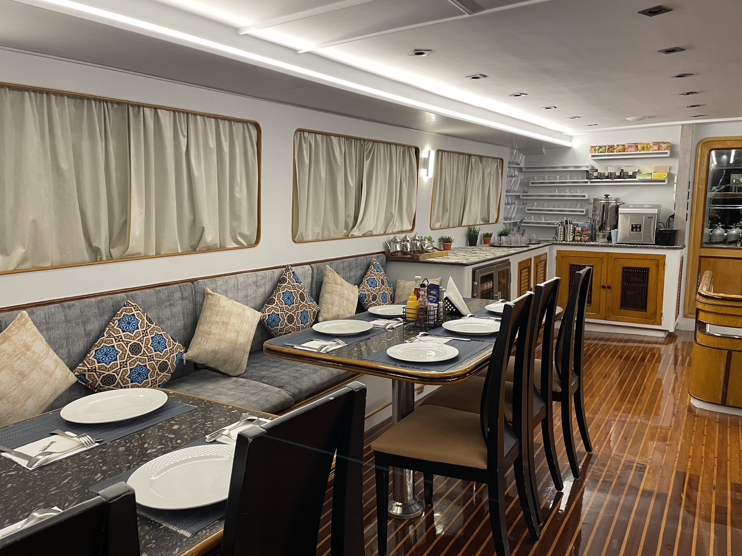 Lounge and dining spaces aboard 4Ever Sea